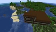 This coastal mansion also has a shipwreck near it to loot (Image via Mojang)